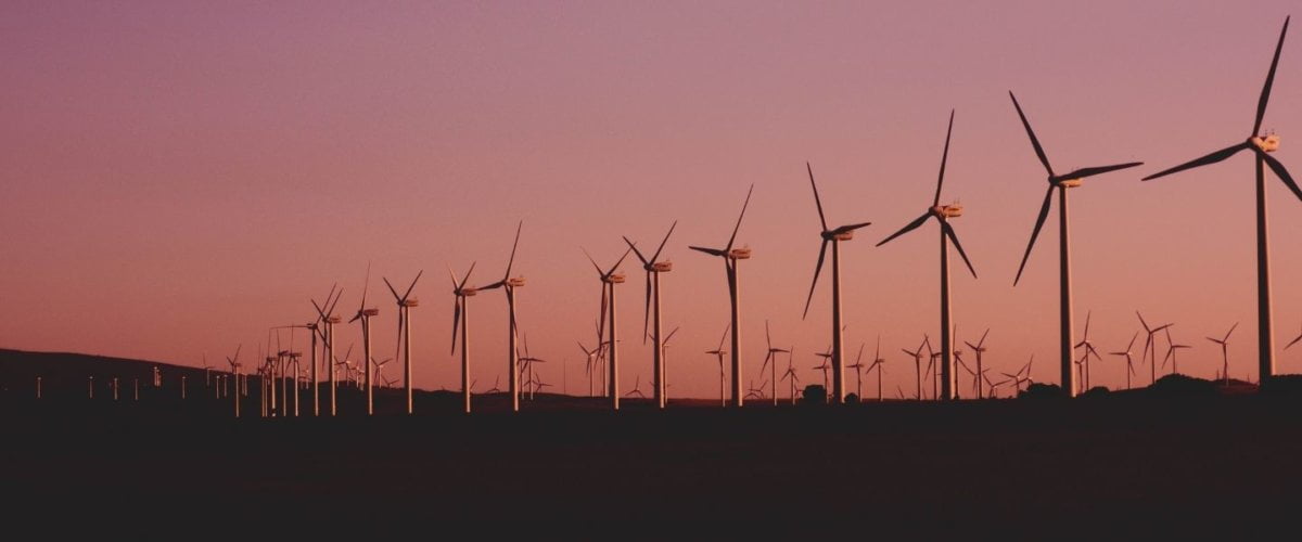 Photograph of onshore wind farm. Trackplot supports lone workers in the Utilities and Renewables sector.